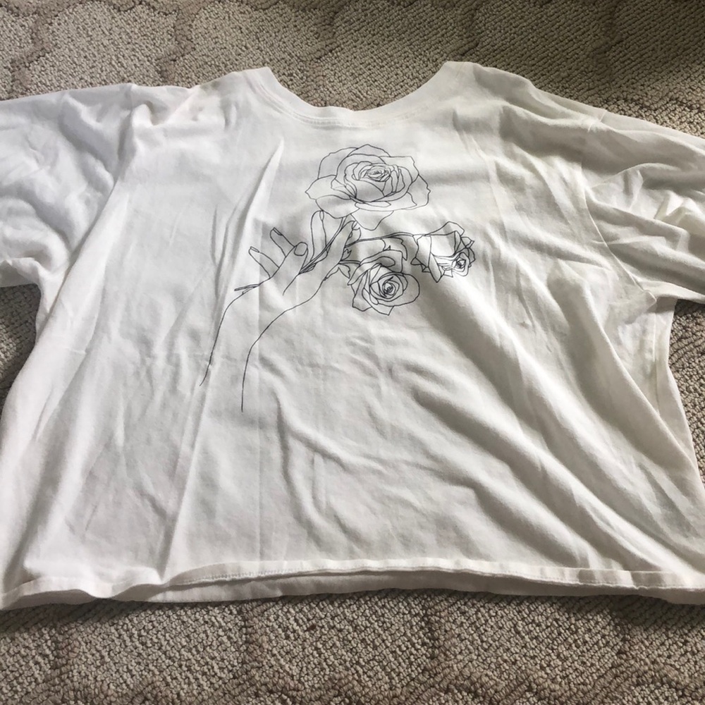 Cropped hand and rose printed shirt